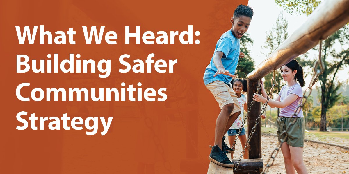 Three children playing in a park setting with the text "What We Heard: Building Safer Communities Strategy" on an orange overlay. 