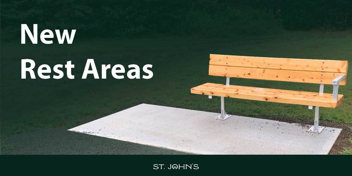 Bench with text that says New Rest Areas