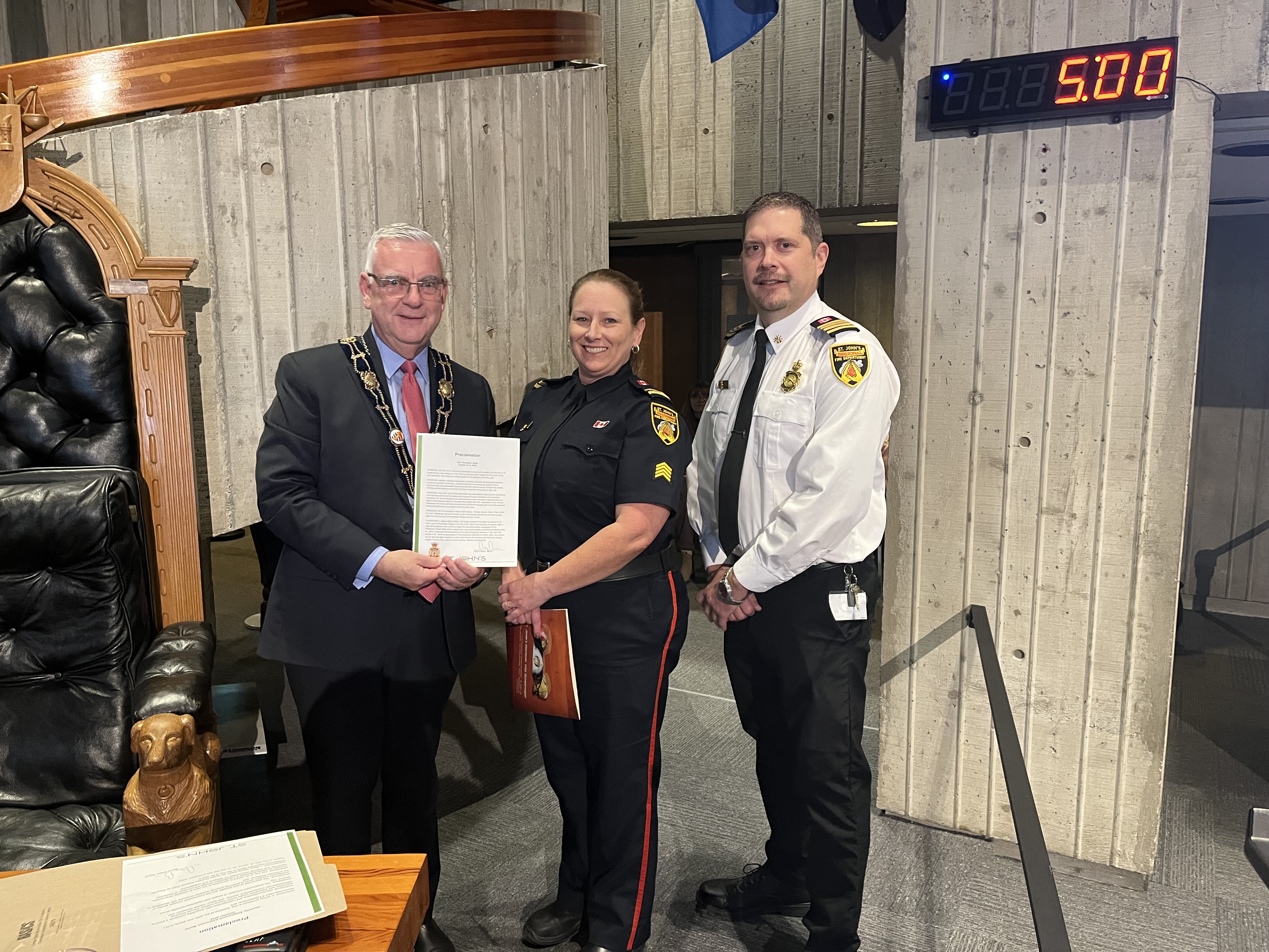 Mayor Breen with Cara Pardy and Ian Green from the SJRFD