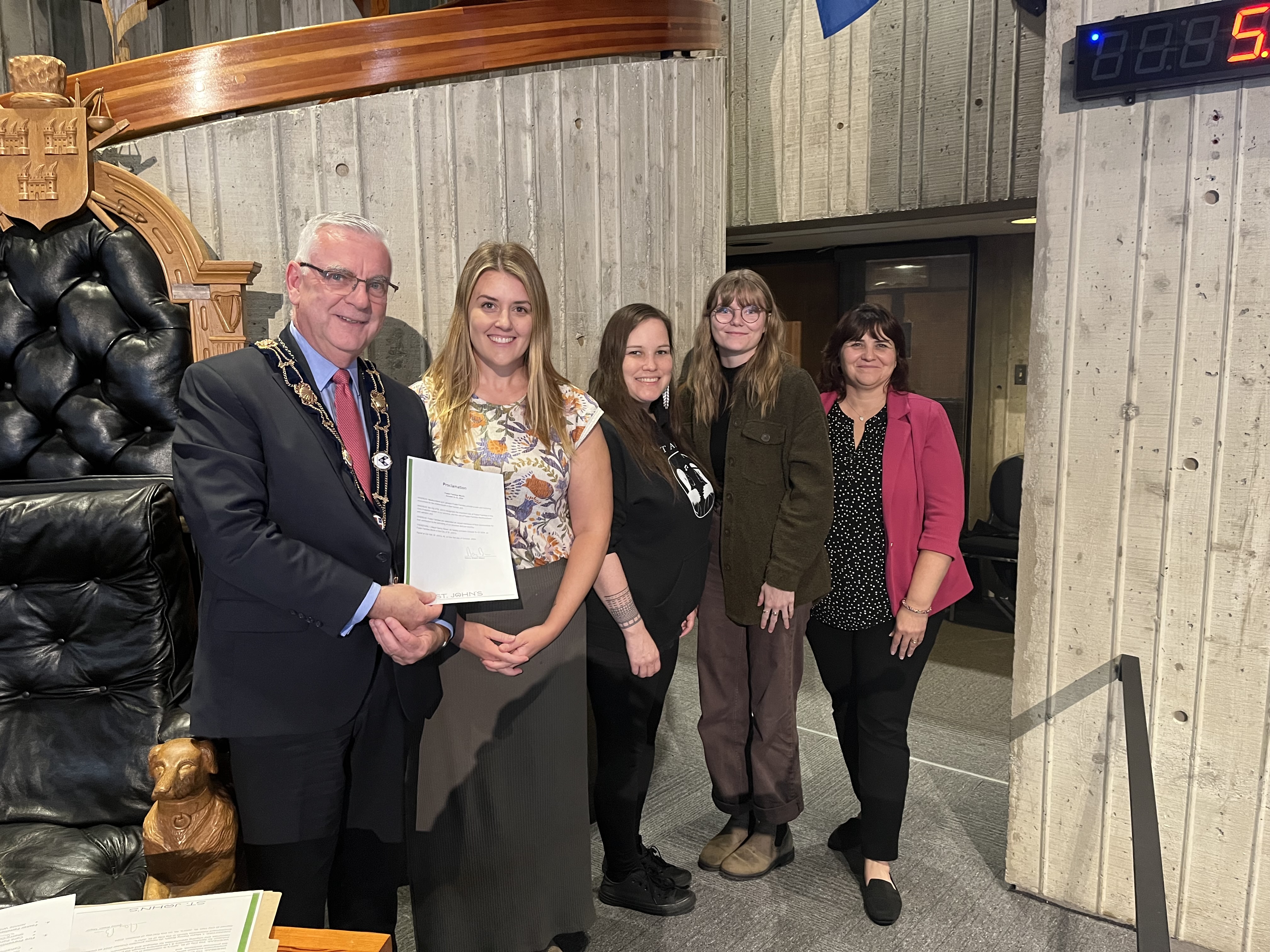 Mayor Breen with Kelli Hodder, Foster Families NL, Jennie Williams, Foster Parent, Gina Ford Power, Bachelor of Social Work student and Lori Petersen, Foster Families NL for the proclamation.  