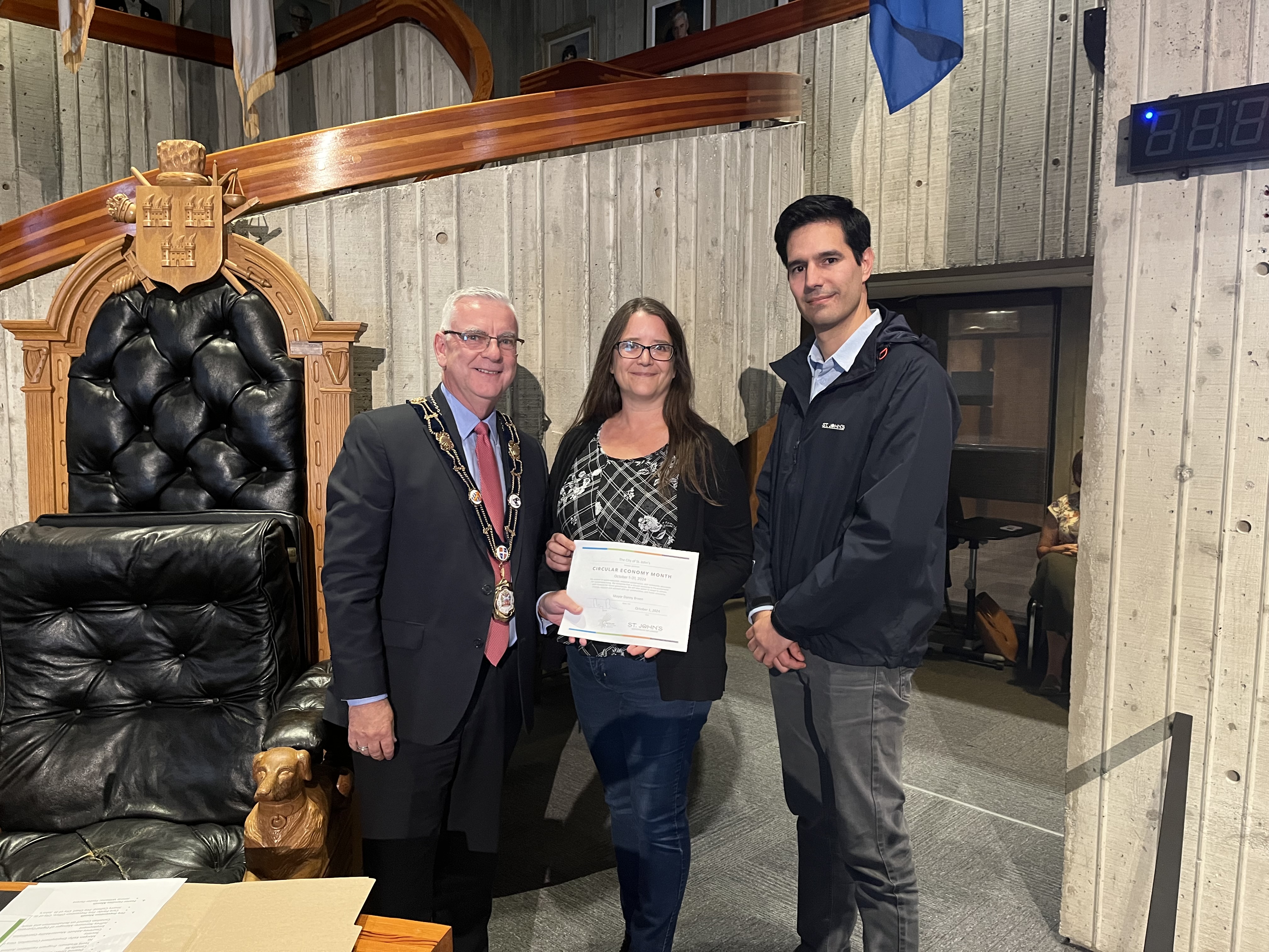 Mayor Breen, Shelley Pardy and Edmundo Fasuto in council chmabers for signing of a proclamation 