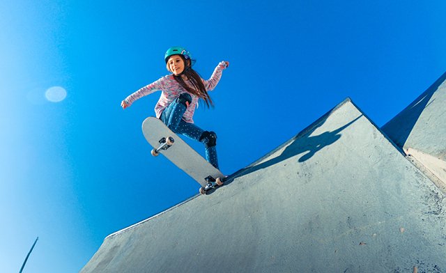 Skateboarder doing a trick in the air