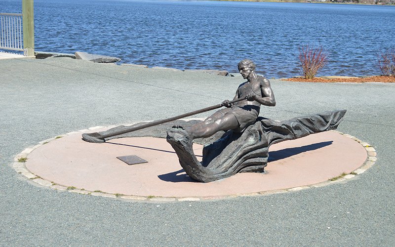 The Rower sculpture on the southwest shore of Quidi Vidi Lake. The sculpture depicts a male rower pulling an oar in a rowing shell